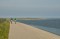 Cycling along the Wadden Sea dyke at De Cocksdorp
