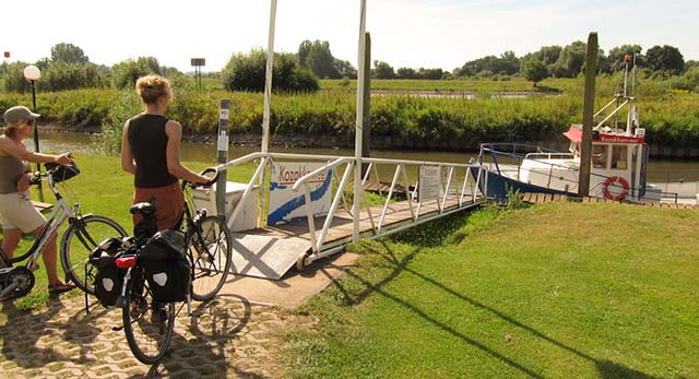 Boarding a bicycle ferry over the River IJssel. Boarding a bicycle ferry over the River IJssel. Photo © Holland-Cycling.com